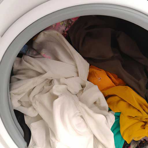 Can You Put White And Colors in the Washer Together 